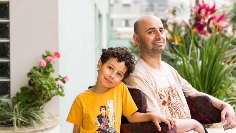 Jaime and his son, Jaime lives with primary progressive multiple sclerosis, Brazil.  